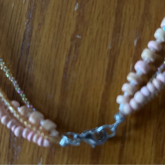 Necklace cute four bead strands 21” with plastic 2” pendant in soft peach color. - Picture 7 of 7